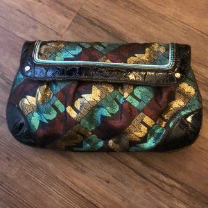L.A.M.B. black with metallic embroidered clutch